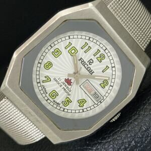 Vintage 1986 Ricoh Automatic Mens Silver Watch W/daydate & Green accents